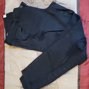 Skinny black ripped jeans